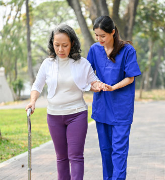 two women walking outdoor